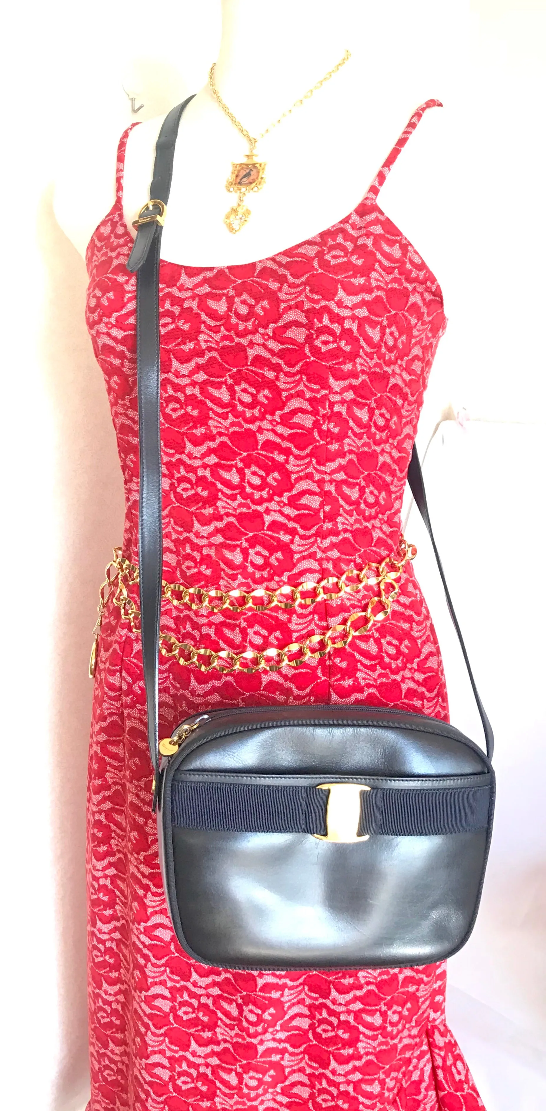 Vintage Salvatore Ferragamo dark navy leather shoulder bag with golden logo embossed motif from vara collection. Classic purse. 050406r7