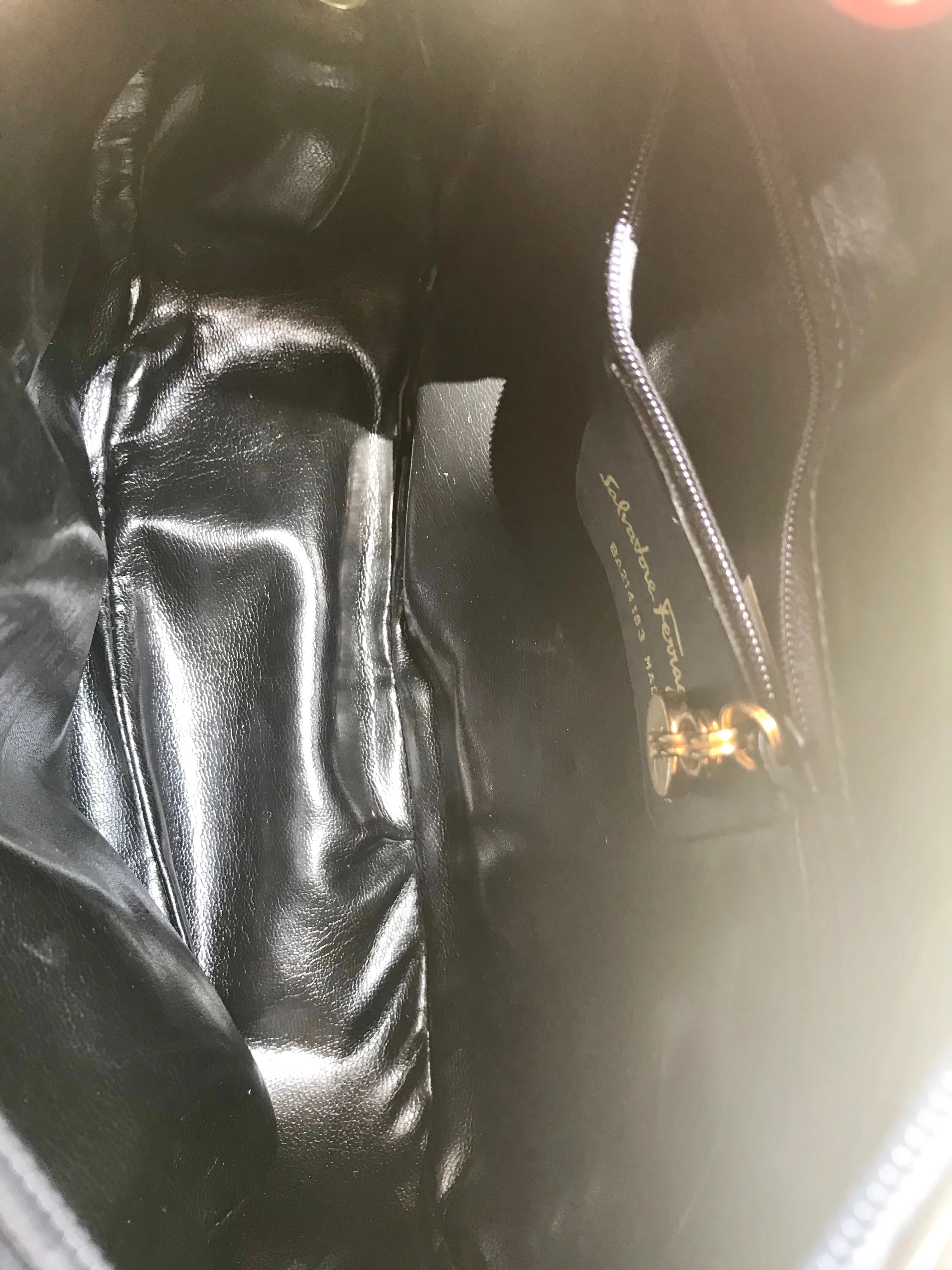 Vintage Salvatore Ferragamo dark navy leather shoulder bag with golden logo embossed motif from vara collection. Classic purse. 050406r7